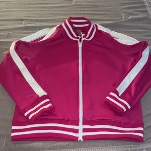 A Fuchsia pink track suit….never been worn. Two way zipper…Size large.